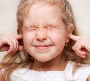 Girl covered her ears